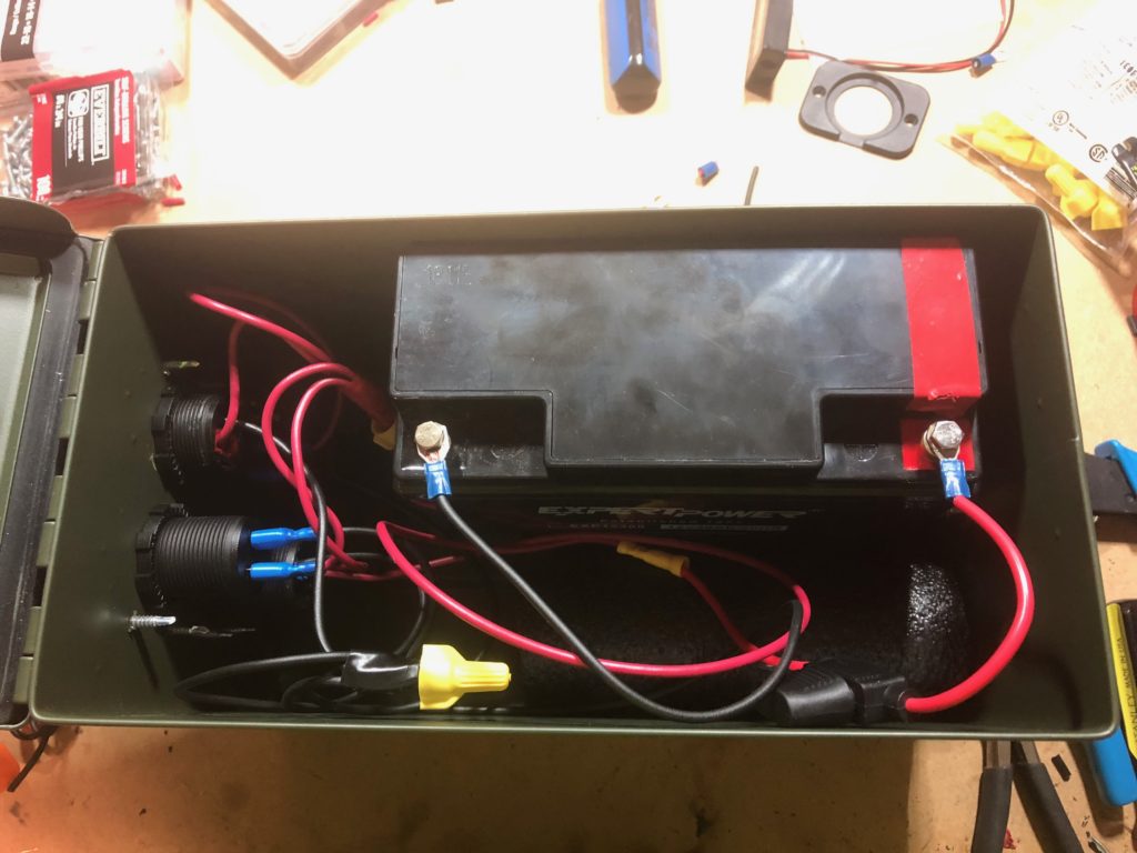 The inside of the battery box, wires and all.
